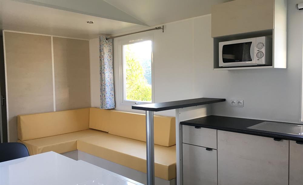 Sofa area of Mobile-home (4 rooms) at Camping du Futur